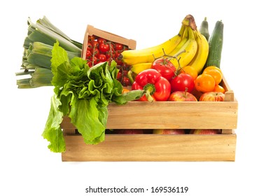 Wooden crate fresh vegetables and fruit isolated over white background - Powered by Shutterstock