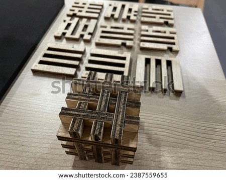 Wooden criss cross cube puzzle using laser cutting machine