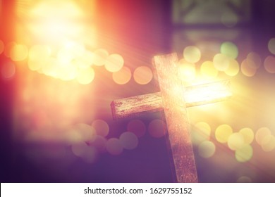 Wooden Cross Decoreted In Church Under The Ceremonial Lighting