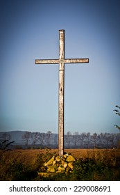 Wooden Cross At The Field In Autumn