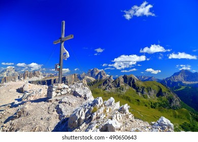 Wooden cross marks the summit of Averau peak, Dolomite Alps, Italy - Powered by Shutterstock