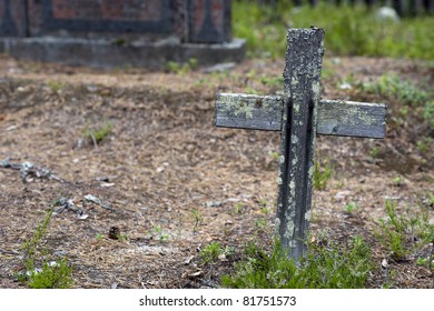 Wooden Cross On Old Grave Yard