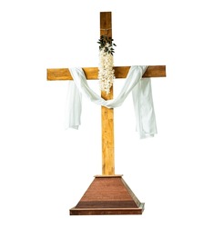 Wooden Crucifix Wrapped In Fabric Isolated On White Background.