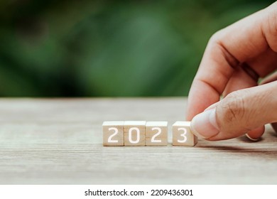 Wooden Cube Block With Text 2023 On Table With Copy Space. Countdown To 2023 Happy New Year Background Banner. Business Planning In 2023 Concept.