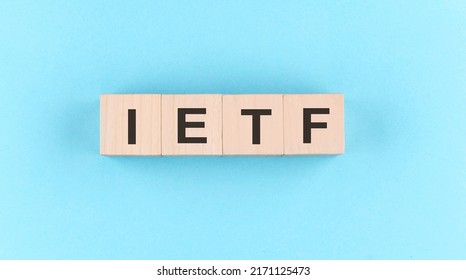 Wooden Cube Block With Text IETF Internet Engineering Task Force On Blue Background