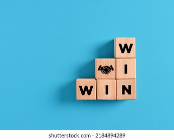 Wooden Cube Ladder With The Word Win Win. Win Win Situation In Business Strategy.