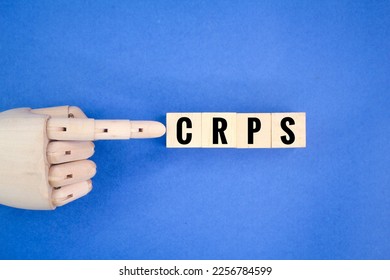 wooden cube with the letters CRPS or the word complex regional pain syndrome - Shutterstock ID 2256784599