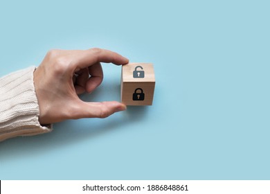 Wooden Cube With An Open And Closed Lock Pattern. Day Of Protection Of Personal Data. Protection Of Personal Information