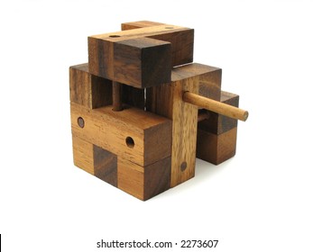 Wooden cube puzzle. Isolated on white background. Contains Clipping Path.