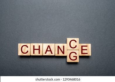 Wooden cube with word change to chance on wood table. Personal development and career growth or change yourself concept. concept of motivation, goal achievement, potential, incentive, overcoming