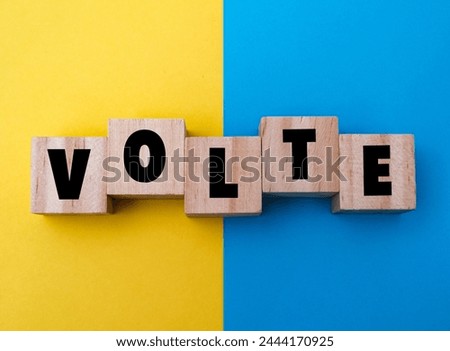 A wooden cube with word  “VOLTE” on it. VOLTE stands for “Voice Over Long Term Evolution”