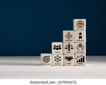 Wooden cubes with core corporate values for goal achievement and business success. Company culture, guiding principles and business strategy concept. - Shutterstock ID 2179510171