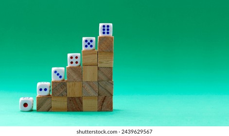 Wooden cubes forming a staircase with a die indicating by its number the level of each step