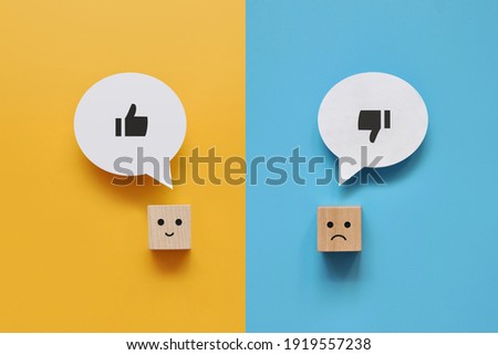 Wooden cubes with the image of like and dislike. Choose between like and dislike Stock foto © 