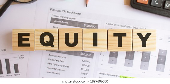 Wooden Cubes With Letters On The Table In The Office. Text EQUITY. Financial Concept.