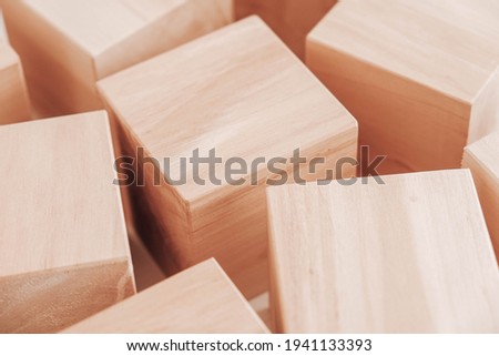 Wooden cubes from natural wood on a white background. Copy, empty space for text.