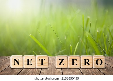 Wooden cubes with net zero icon in natural background. Net zero Carbon neutral. Net zero greenhouse. Climate neutral long strategy. - Shutterstock ID 2156650455