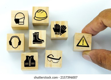 wooden cubes with safety icons under construction. Safety First Construction Concept - Shutterstock ID 2157396007