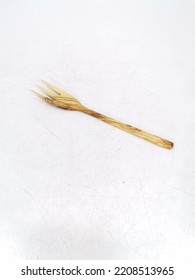 Wooden Cutlery Set On A White Background