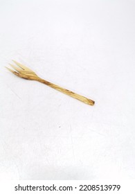 Wooden Cutlery Set On A White Background