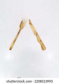 Wooden Cutlery Set On A White Background