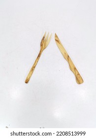 Wooden Cutlery Set On A White Background