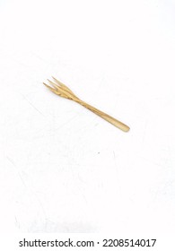 Wooden Cutlery Set On A White Background