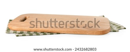 Wooden cutting board and checkered towel on white background