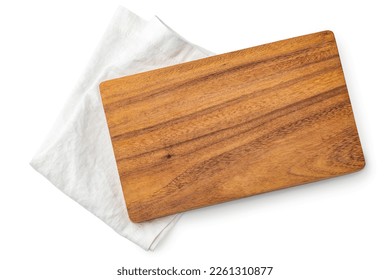 Wooden cutting board on white linen napkin, serving platter, isolated on white background, top view