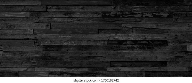Wooden Dark and Black Background  Boards. Rough Floor Or Wall Texture With Peeling And Cracks. Long Panoramic Banner. 