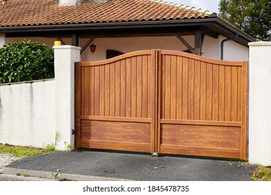 wooden dark natural brown gate portal of suburb door house 