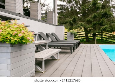 Wooden deck beach sea ocean resort sun lounger umbrella hotel pool sky sunrise - Powered by Shutterstock