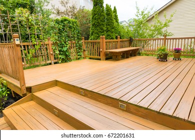 Wooden deck of family home. - Shutterstock ID 672201631