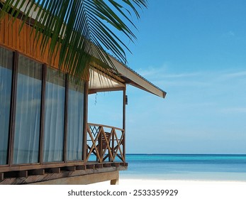 Wooden deck overlooking turquoise water with white sand beach and blue sky. Suitable for travel, vacation, relaxation concepts. - Powered by Shutterstock