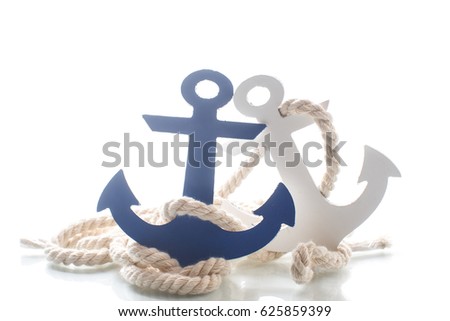 Wooden decorative anchor on the white background