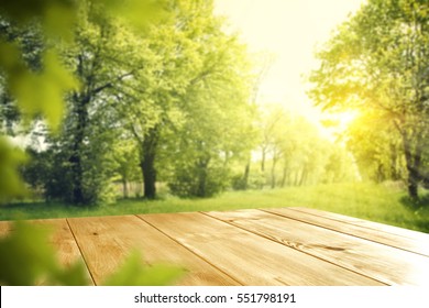 wooden desk of free space and spring time  - Shutterstock ID 551798191