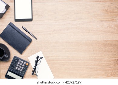 Wooden Desk With Office Tools On Its Left Side. Topview, Mock Up