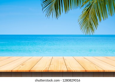 Wooden Desk Or Plank On Sand Beach In Summer. Background. For Product Display.