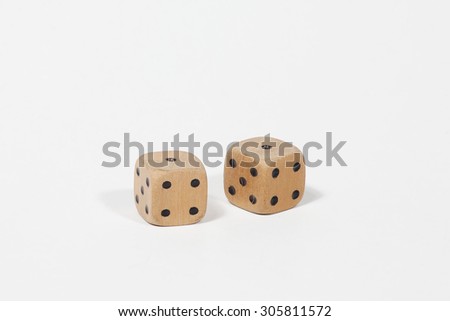 Wooden dices, retro scene on a white background.