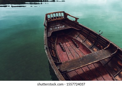 Wooden Dinghy Rowboat On Lake In Morning