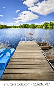 Wooden Dock On Beautiful Summer Lake In Ontario Canada