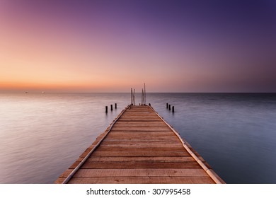 Wooden Dock At Sunset. Pemalang, Central Java, Indonesia.