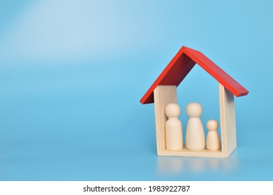 Wooden Doll Figures Of Family And Toy House.