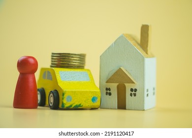 Wooden Doll People, Car, Stack Coin With House. Property Investment, Saving For The Future And Building A House. The Concept Of Affordable Housing And Car, Mortgages For Buying A Home Or Car.