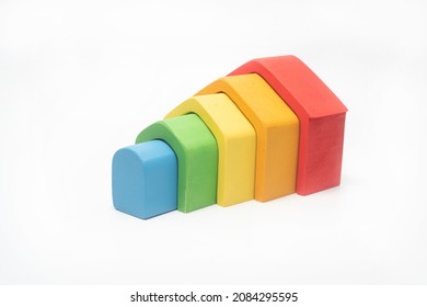 Wooden Dollhouse Models In Rainbow Colors.