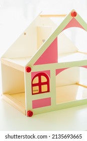 Wooden Dollhouse On A White Background