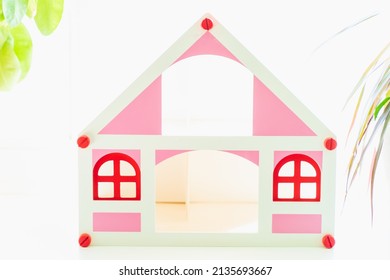 Wooden Dollhouse On A White Background