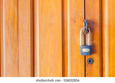 Wooden door with lock.