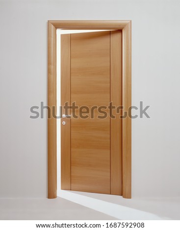 Wooden door on a white background
