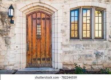 Wooden door and window on the stone facade of historic building, Atlanta, USA